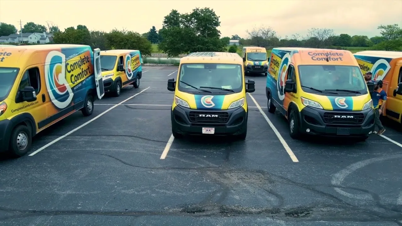 Complete Comfort branded service trucks