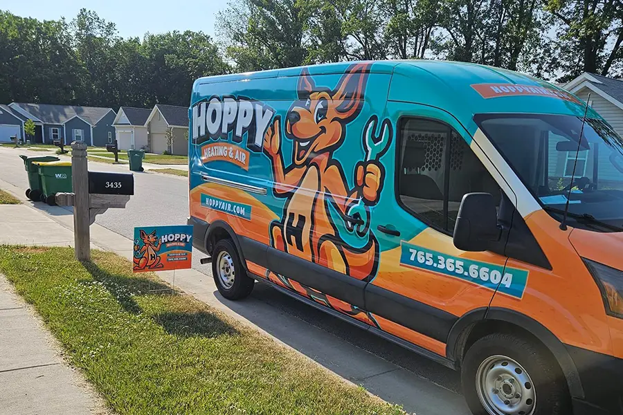 Hoppy Heating & Air service van in an Indiana neighborhood